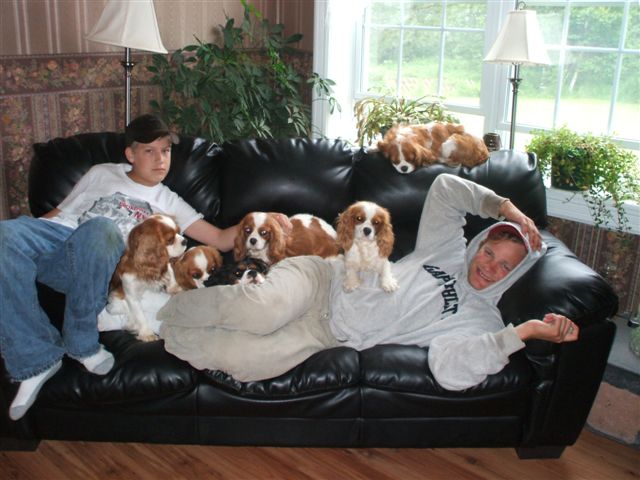 All piled up on the couch with my brother and one of our boys.